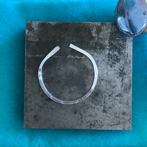 Margot Potter's Silver Circle Earrings - , Contemporary Wire Jewelry, Forging, Forging Jewelry, Jewelry Forging, How To Punch Holes, Hole Punching, Punch A Hole, hammer